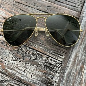 Classic Ray-Ban aviators. Gold frames in well loved condition. Small scratches
